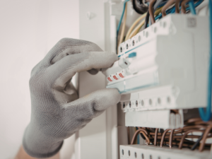 Person checking a circuit breaker