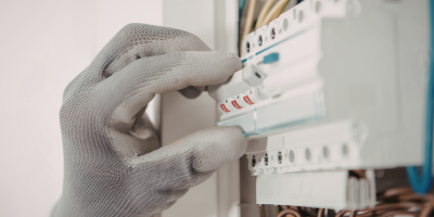 Person checking a circuit breaker